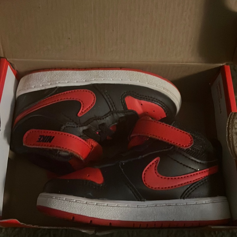 Gently used toddler Nikes. Red & black